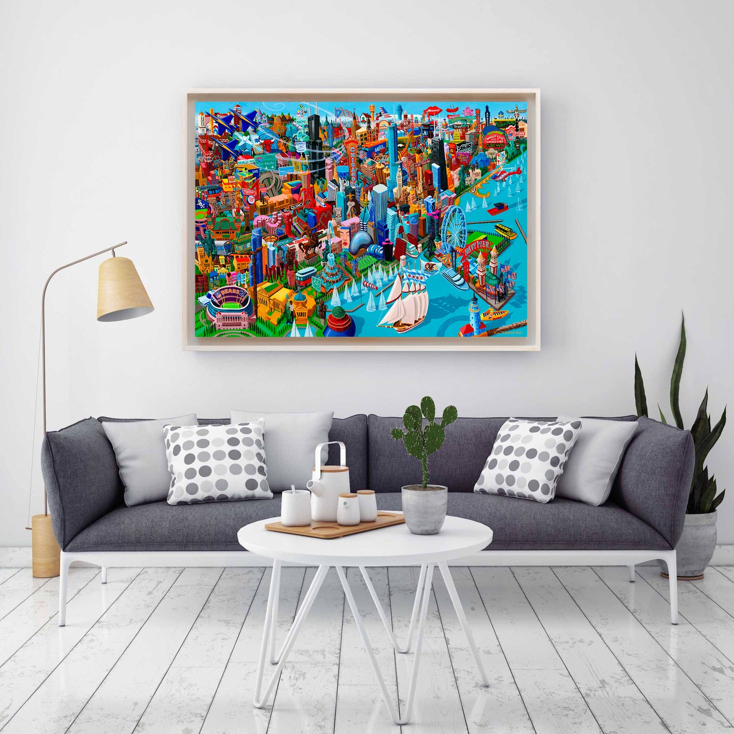 Colorful Chicago city print in a modern living room with a gray sofa and white coffee table.